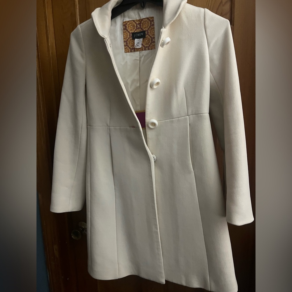 J crew coat cream size 2. Nice condition but small stain on sleeve